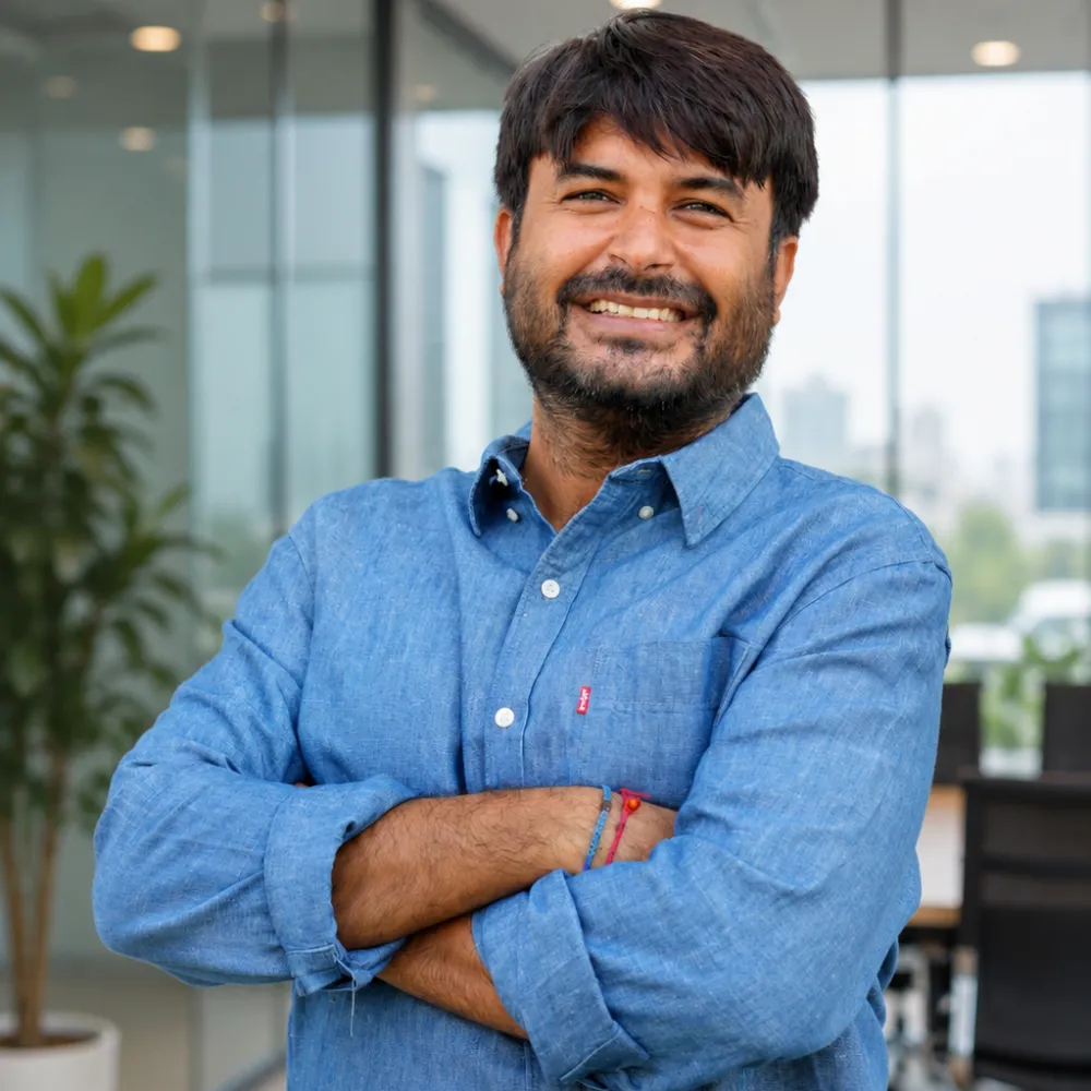 Professional portrait representing founder Ashish Thakkar